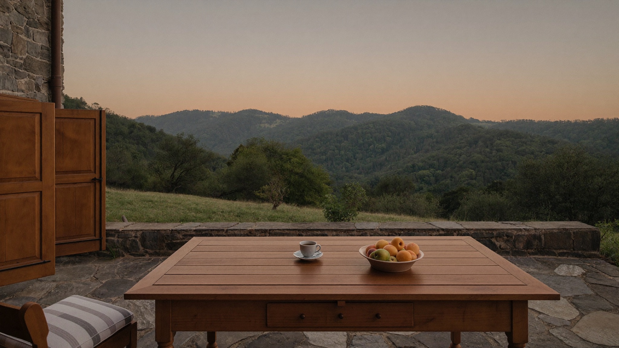 Breakfast terrace of a guesthouse in Dilijan overlooking forested hills
